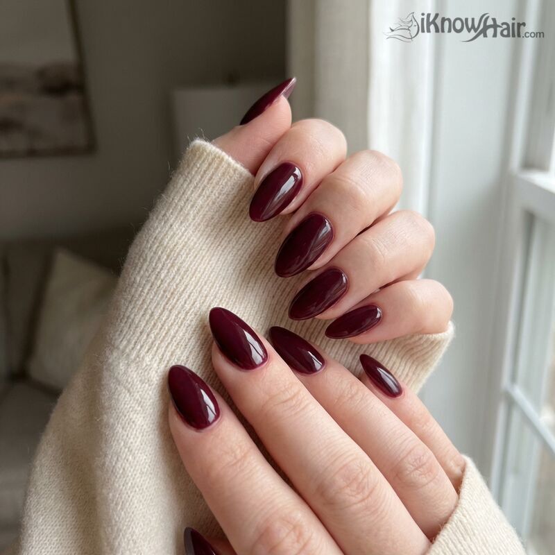 Deep Burgundy Almond Nails close-up manicure detail
