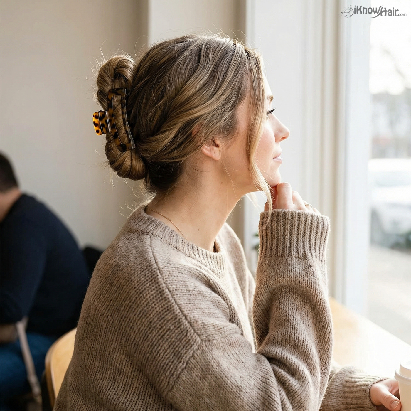 Woman with elegant claw clip updo